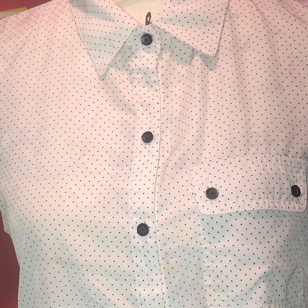 Polka dot sleeveless blouse